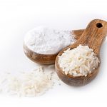 Rice,Flour,In,A,Wooden,Spoon,Isolated,On,A,White